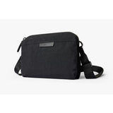 Bellroy Tokyo Side Bag in Raven, a sleek black crossbody bag with adjustable strap and minimalist design, suitable for daily use.