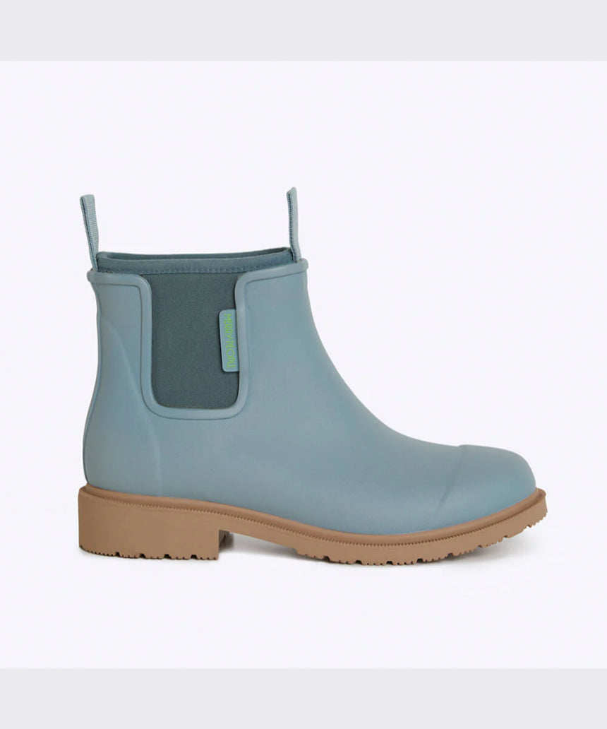 Seafoam Merry People Bobbi gumboots shown from the side, featuring waterproof rubber design and stylish, vibrant color.