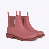Merry People Bobbi gumboots in clay color, waterproof rubber footwear with a textured sole and ankle height design.