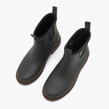 Charcoal Merry People Bobbi gumboots shown from a high angle, featuring waterproof rubber and stylish design for rainy days.