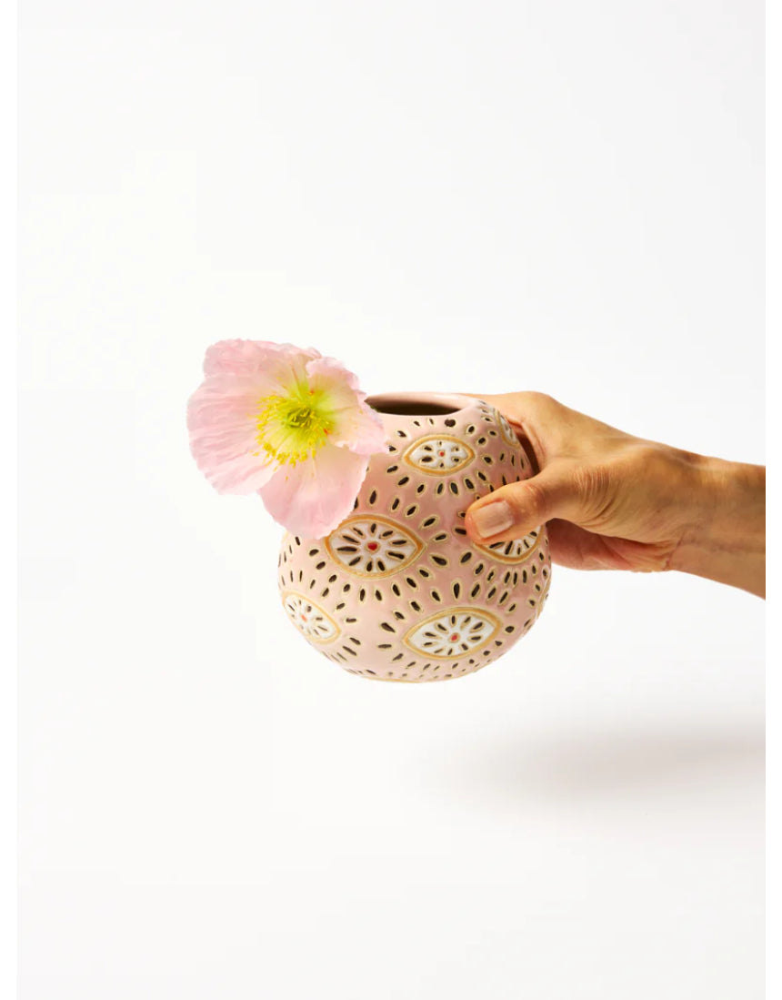 Pink Pollen Vase by Jones & Co featuring a unique eye-inspired design, crafted for decorative floral arrangements.
