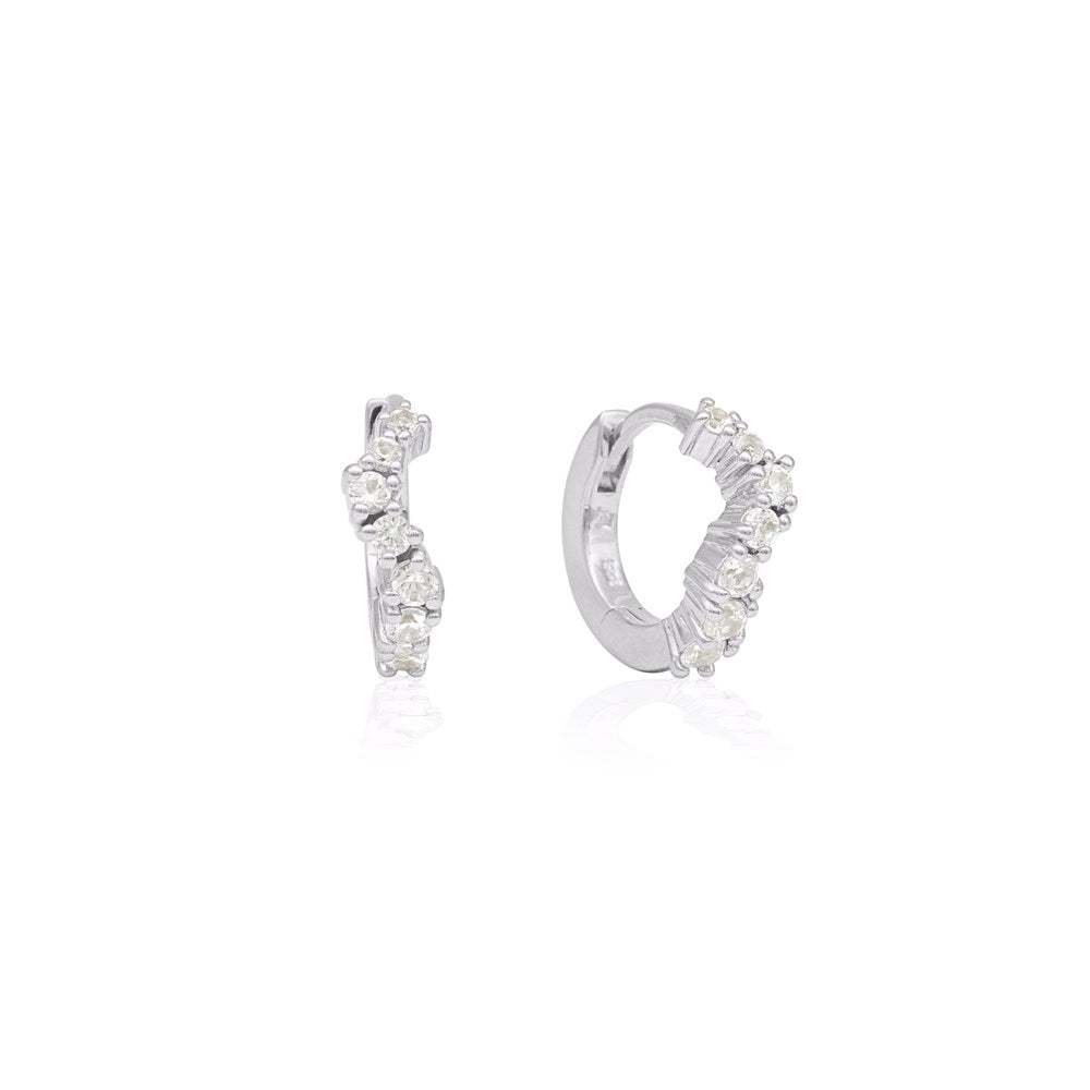 Linda Tahija Ebb Huggie earrings with lab-grown white sapphires in silver