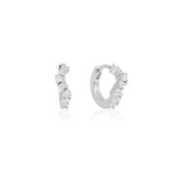 Linda Tahija Ebb Huggie earrings with lab-grown white sapphires in silver