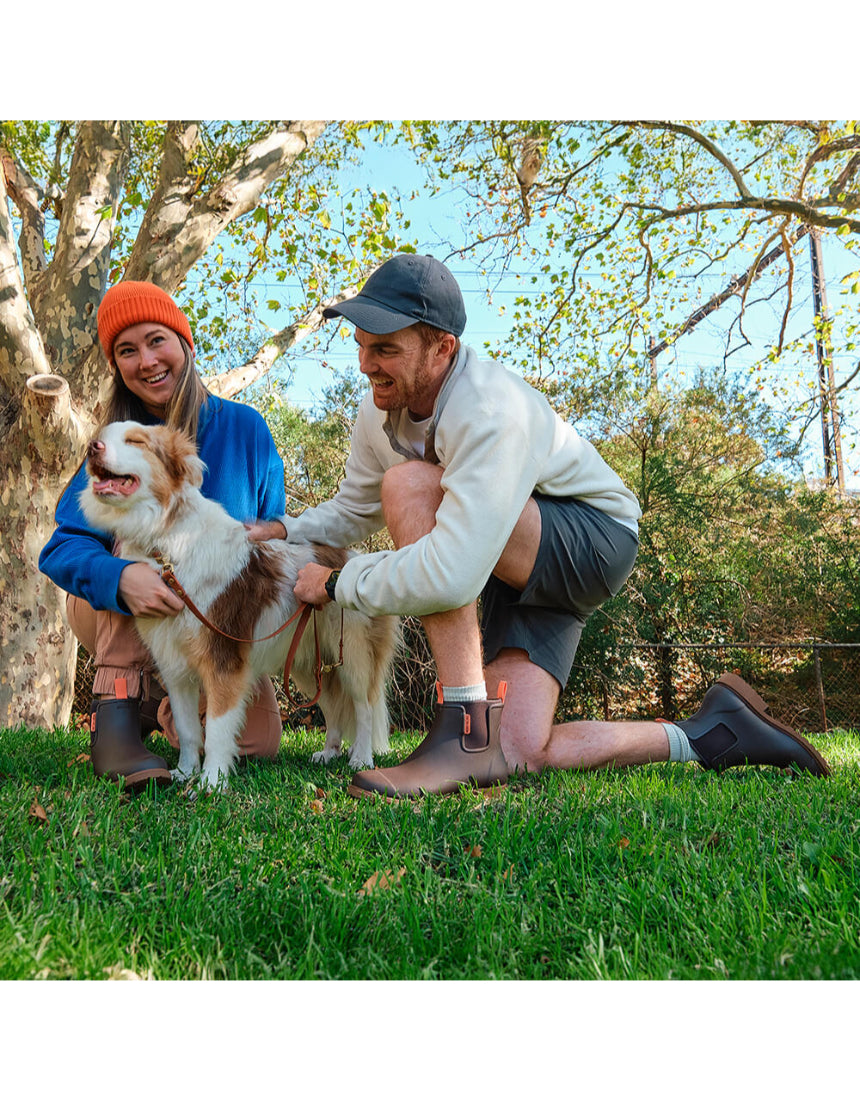Merry People Bobbi Mocha gumboots shown in a lifestyle setting, featuring waterproof design and stylish mocha color.