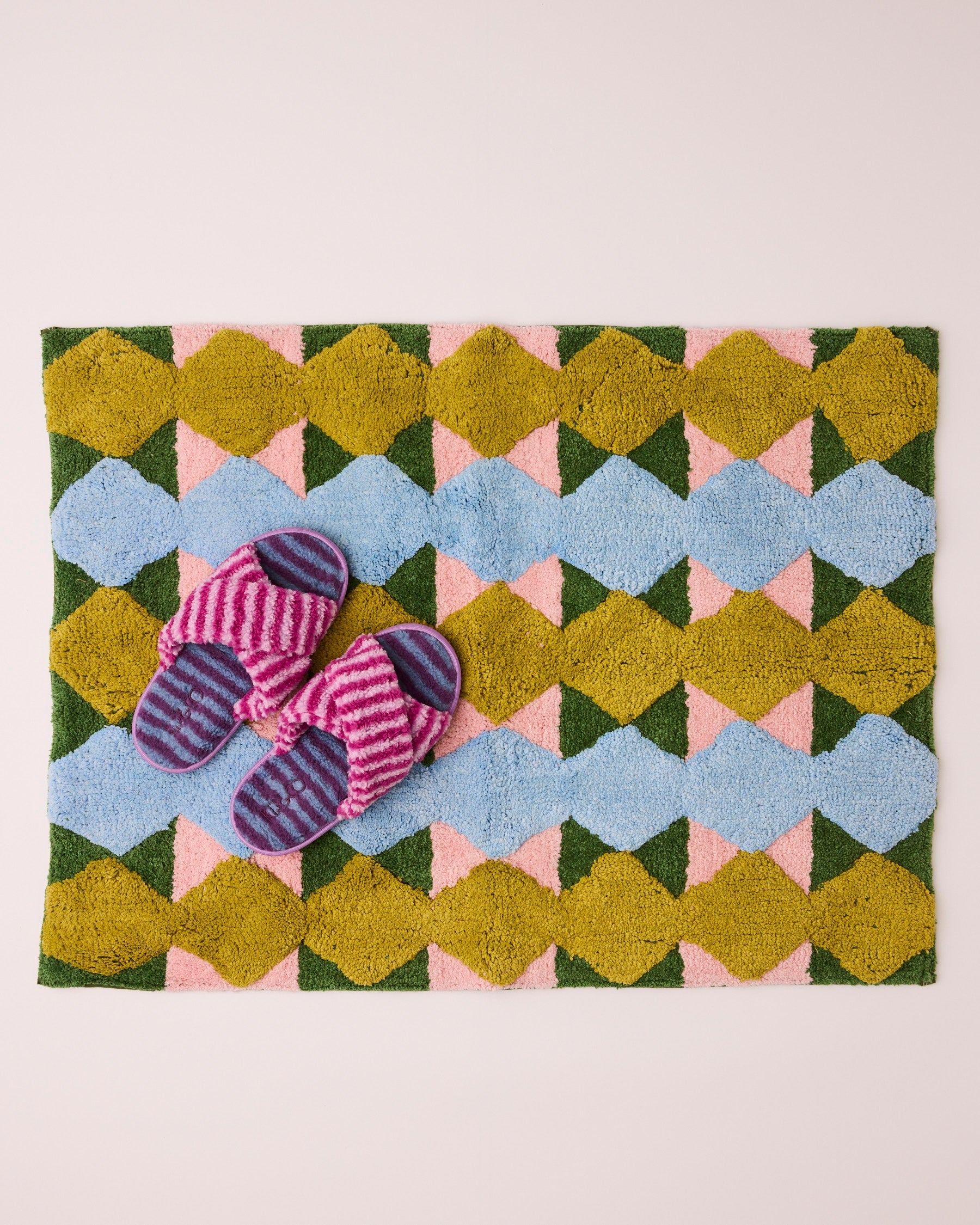Kip & Co Genie bath mat with colorful, soft fabric and playful design, perfect for adding style and comfort to your bathroom.