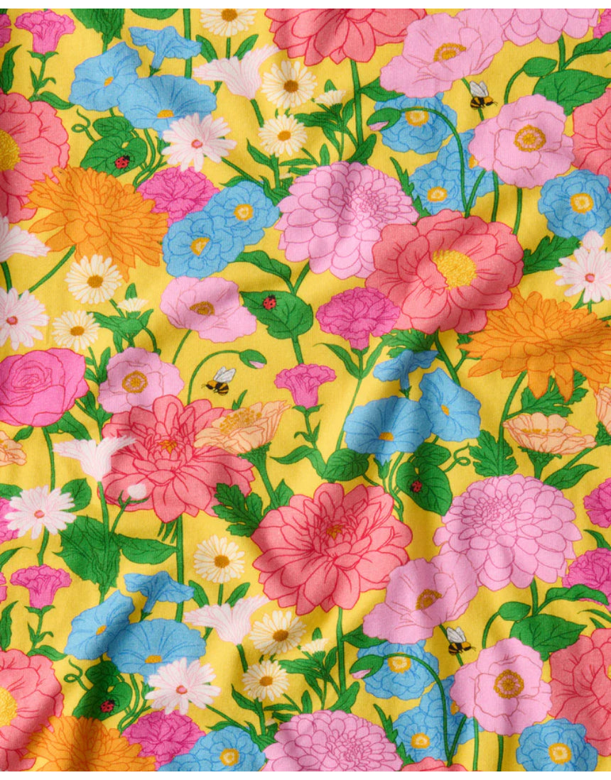 Kip & Co baby clothing Follow the Sun short sleeve frill romper with colorful sun and cloud print for little ones.