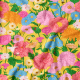 Kip & Co baby clothing Follow the Sun short sleeve frill romper with colorful sun and cloud print for little ones.