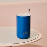 Frank Green iced coffee cup with straw in Deep Ocean color, featuring a sleek, reusable design and spill-proof lid.