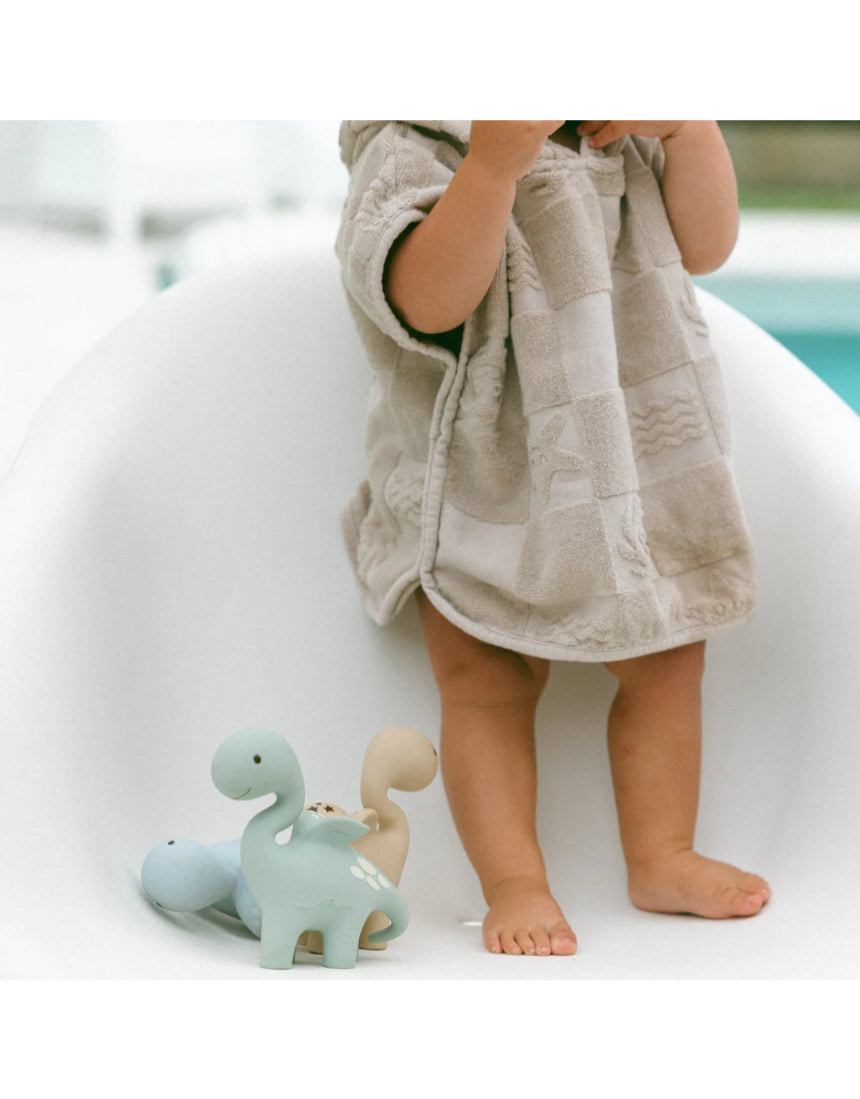 Blue Winnie Parkes Diplo the Dino-Dragon teether with textured surface for soothing and chewing, designed for babies.
