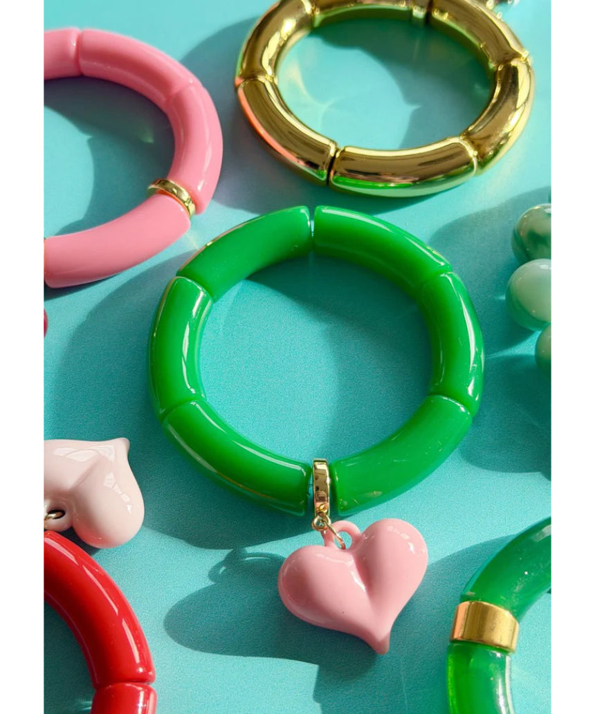 Mosk Melbourne Big Heart Bracelet featuring a large heart charm on a sleek metal chain, stylish jewelry accessory.