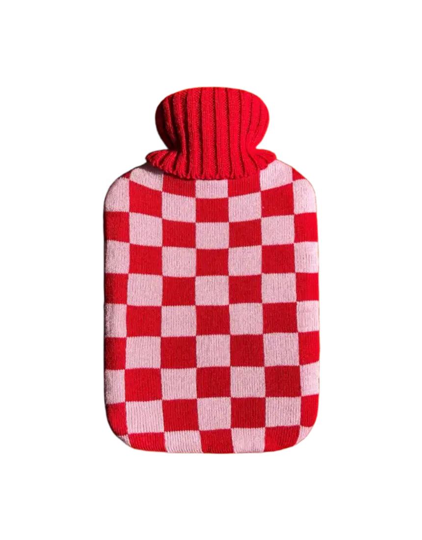Casa Rolio hot water bottle with blush cover, showing the soft fabric and cozy design for warmth and comfort.