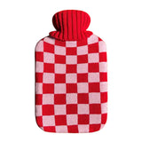 Casa Rolio hot water bottle with blush cover, showing the soft fabric and cozy design for warmth and comfort.