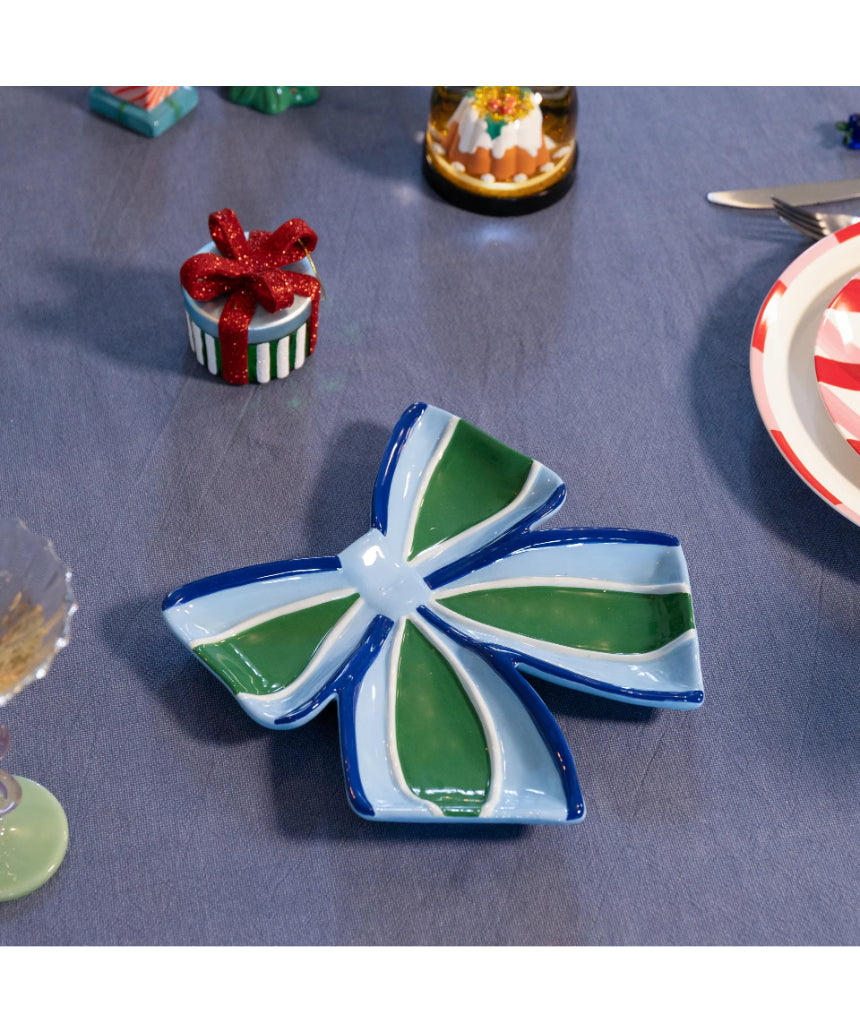 Klevering Plate Ribbon Blue jewelry piece featuring a decorative blue ribbon design on a sleek plate.