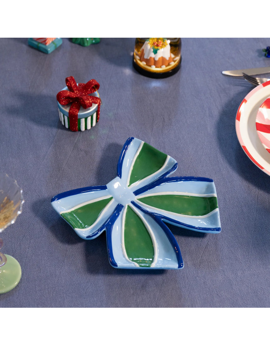 Klevering Plate Ribbon Blue jewelry piece featuring a decorative blue ribbon design on a sleek plate.