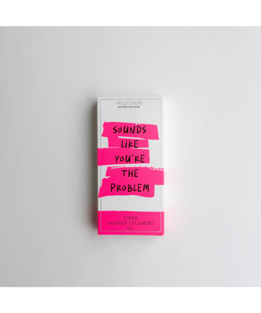 Wild Emery Sounds Like You're the Problem shower steamers in a 3-pack, shown in a close-up image with purple and white bath products.