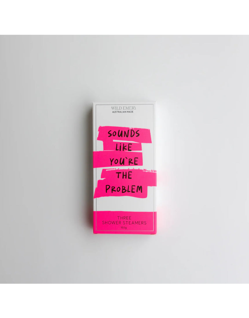Wild Emery Sounds Like You're the Problem shower steamers in a 3-pack, shown in a close-up image with purple and white bath products.