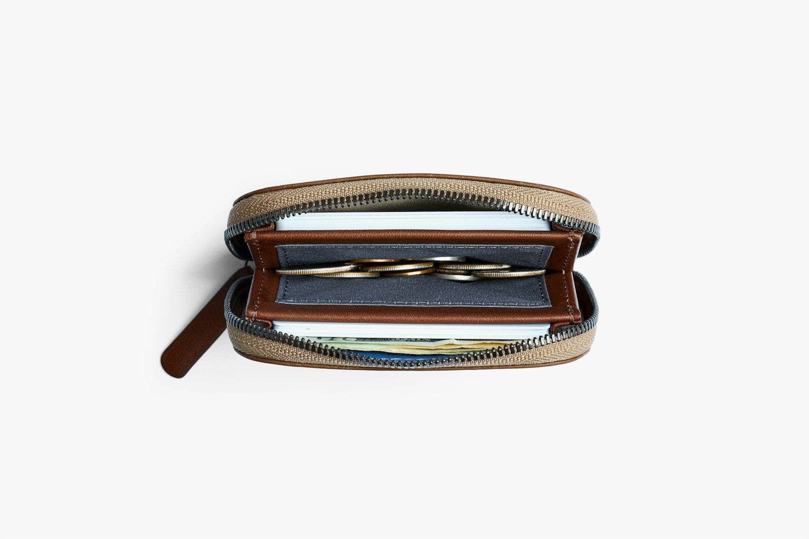 Bellroy Folio Mini wallet in Hazelnut, featuring a slim leather design with card slots and a central cash compartment.