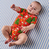 Kip & Co Christmas Toys short sleeve baby romper with colorful holiday-themed print, comfortable cotton fabric, and soft short sleeves.