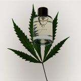 Solid State Hash Extrait de Parfum cologne bottle with minimalist design and clear label, displayed on a neutral background.