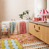 Kip & Co Genie bath mat with colorful, soft textured surface and non-slip backing, designed for bathroom comfort and style.