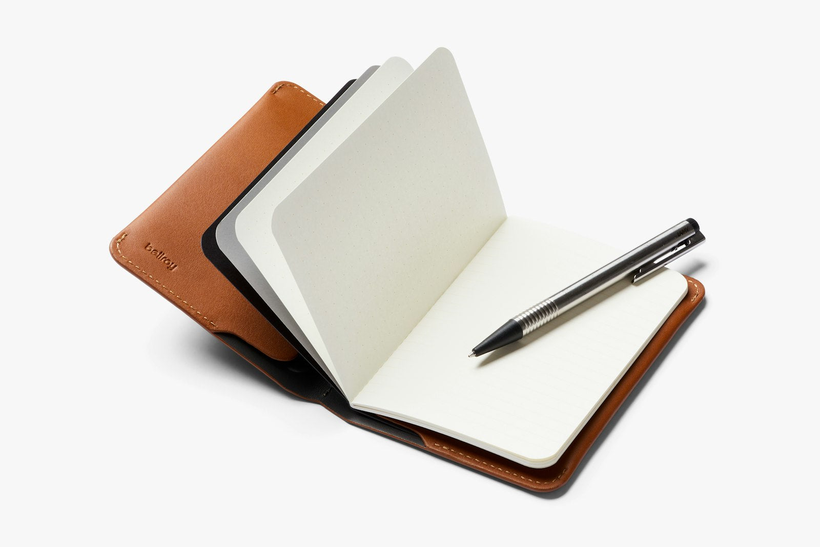 Bellroy notebook cover in caramel leather with sleek design and secure closure for protecting notebooks and stationery.