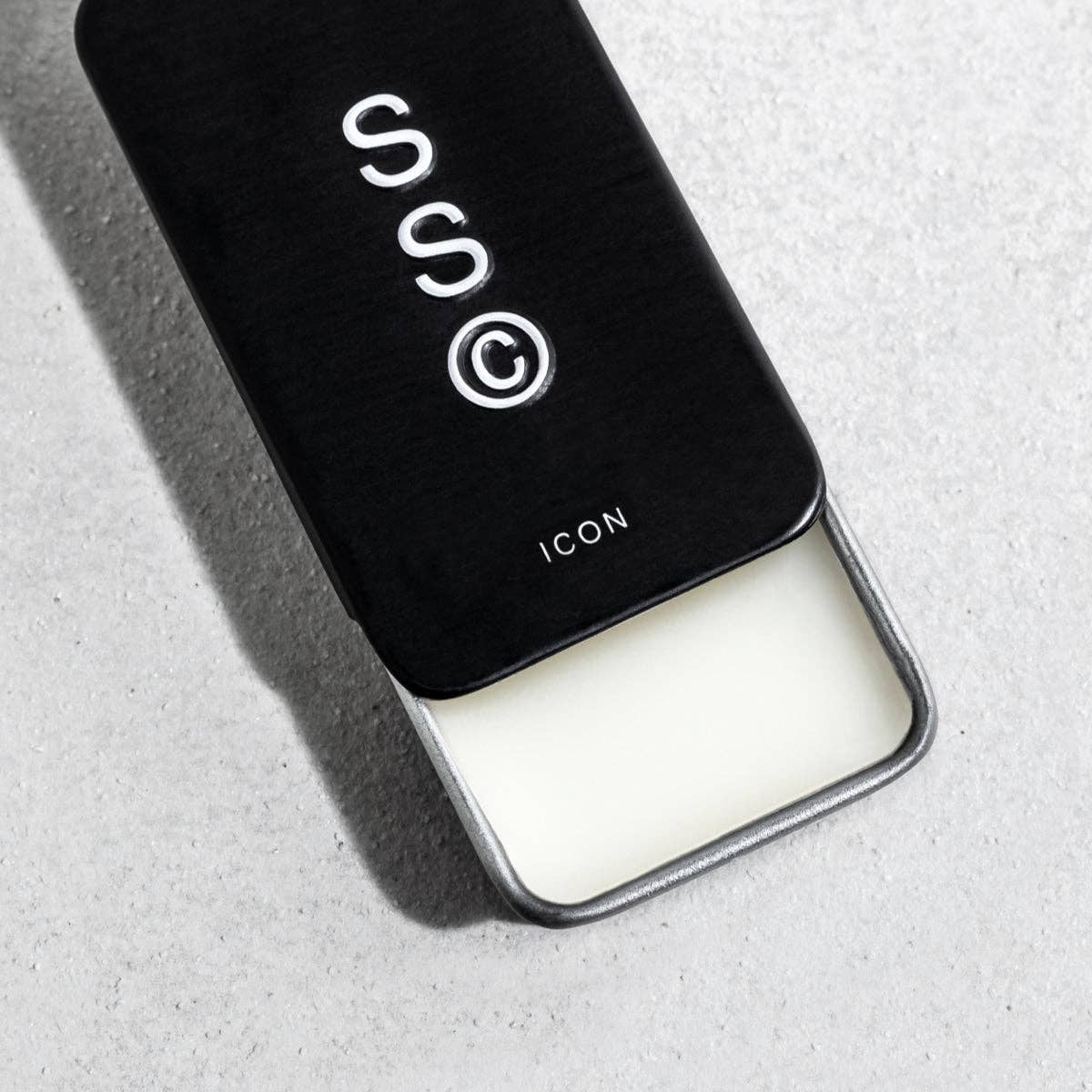 Icon Solid Cologne by Solid State, close-up of sleek black bottle with minimalist label on a white background