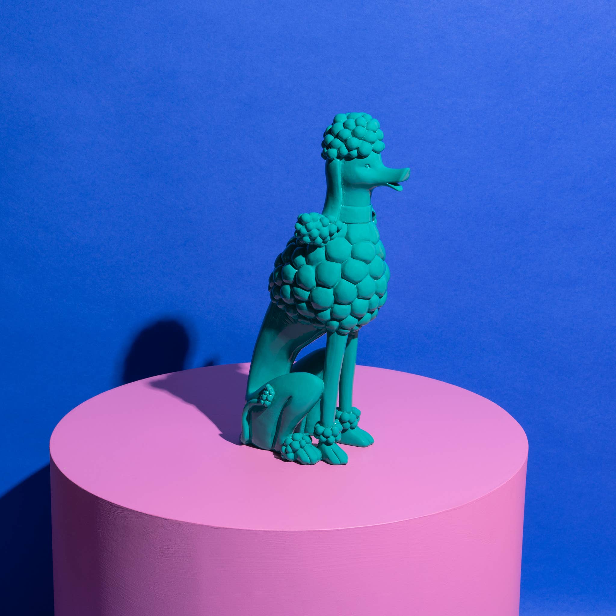 Little Fish Co Paul the Poodle teal decor sculpture showcasing a detailed, colorful poodle figure for home decoration.