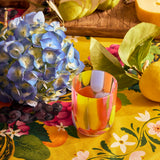 Kip & Co Festiva glass and carafe set with vibrant, colorful patterns, perfect for serving beverages in style.