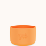 Large Frank Green Bottle Bumper Guard attached to a reusable water bottle, protecting the bottle's surface from impacts.