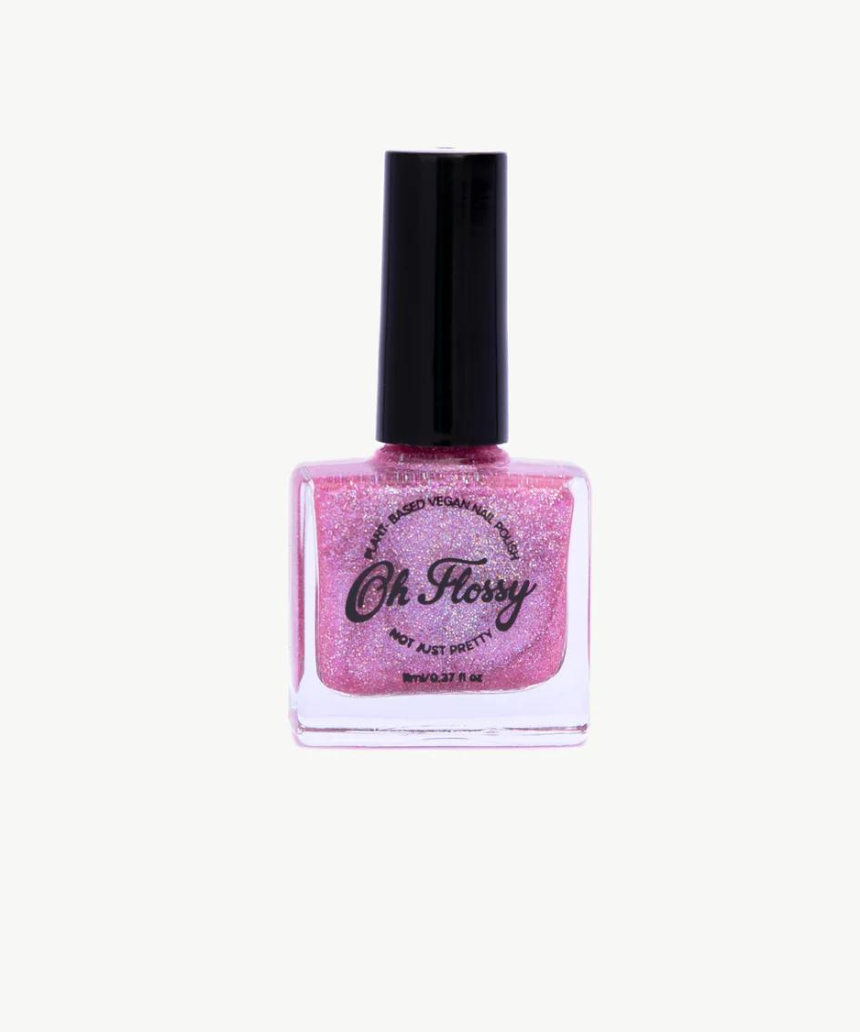 Kids nail polish by Oh Flossy featuring vibrant, colorful bottles perfect for fun, safe nail art for children.