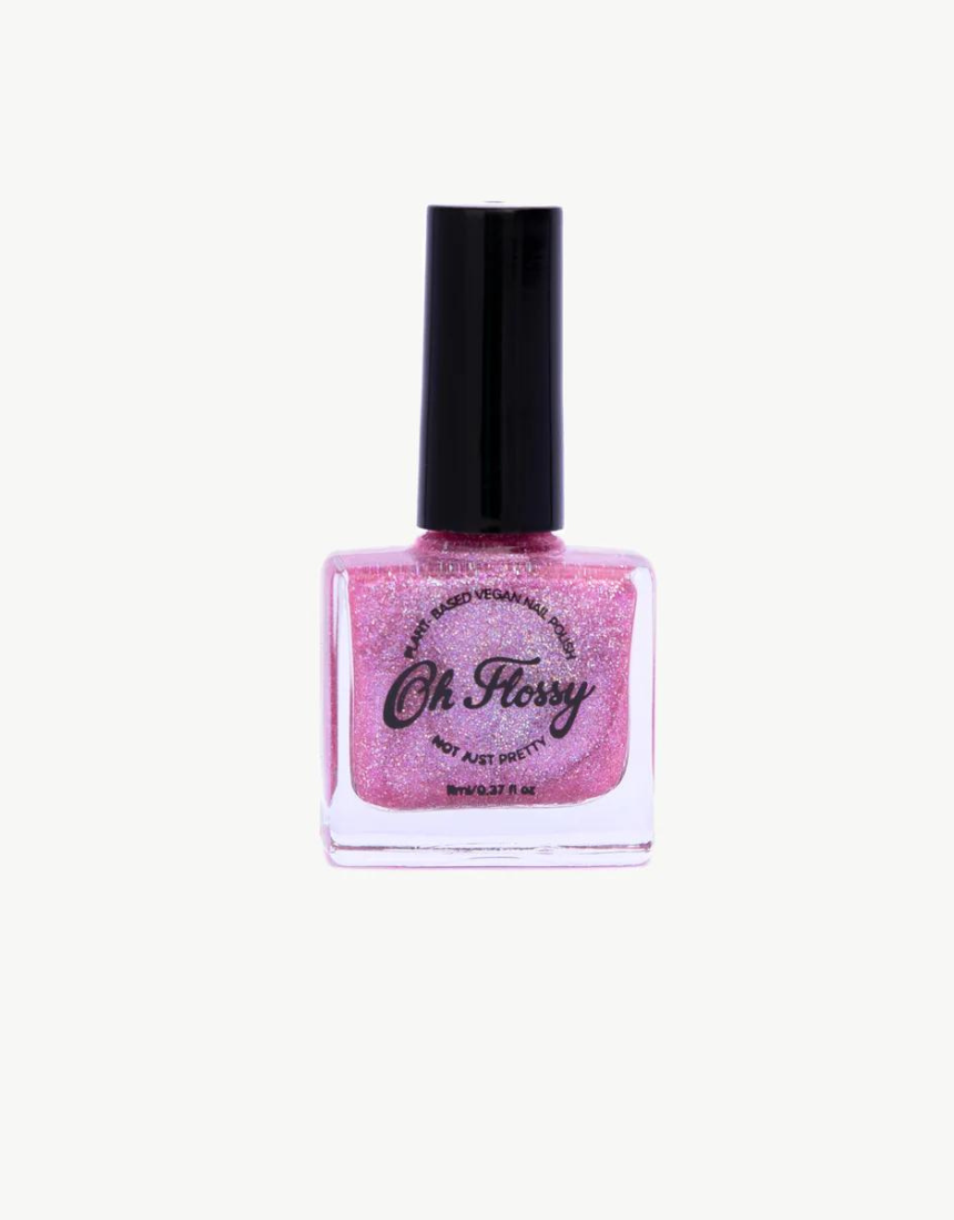 Kids nail polish by Oh Flossy featuring vibrant, colorful bottles perfect for fun, safe nail art for children.