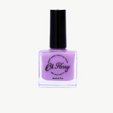 Kids nail polish bottle from Oh Flossy with bright, colorful design and playful packaging for children.
