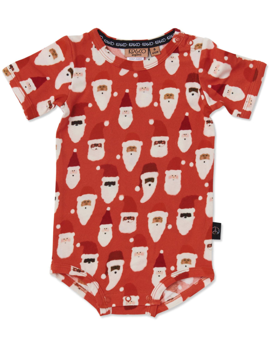 Kip & Co red short sleeve romper for babies and toddlers, featuring festive HoHoHo print and comfortable cotton fabric.