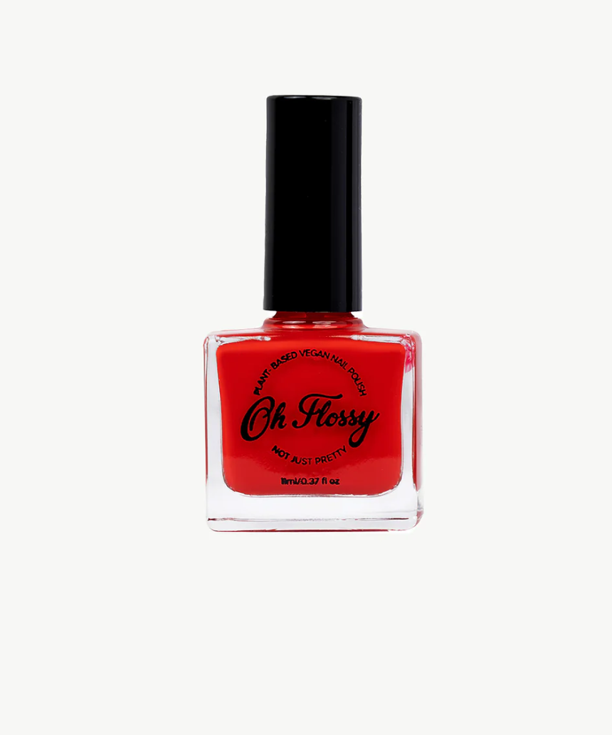 Bright pink kids nail polish by Oh Flossy with a playful bottle design, perfect for young children’s nail art.