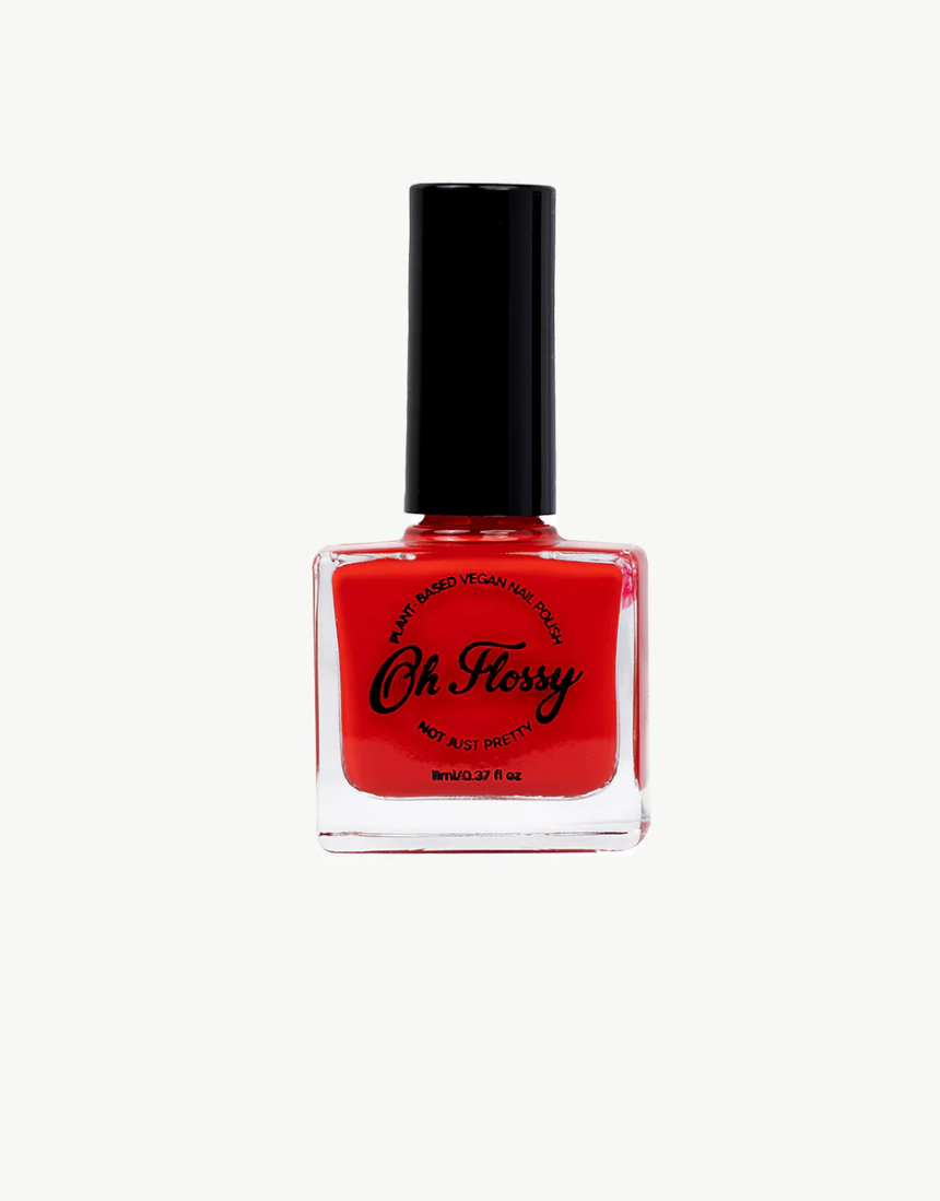 Bright pink kids nail polish by Oh Flossy with a playful bottle design, perfect for young children’s nail art.