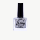 Kids' Oh Flossy nail polish bottle with colorful label and clear glass showcasing bright pink nail color.