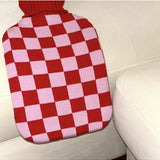 Casa Rolio hot water bottle with blush cover, soft fabric exterior and cozy design for warmth and comfort.
