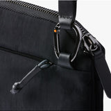 Bellroy Tokyo Side Bag in Raven, a sleek black crossbody bag with adjustable strap and minimalist design, showing front view.