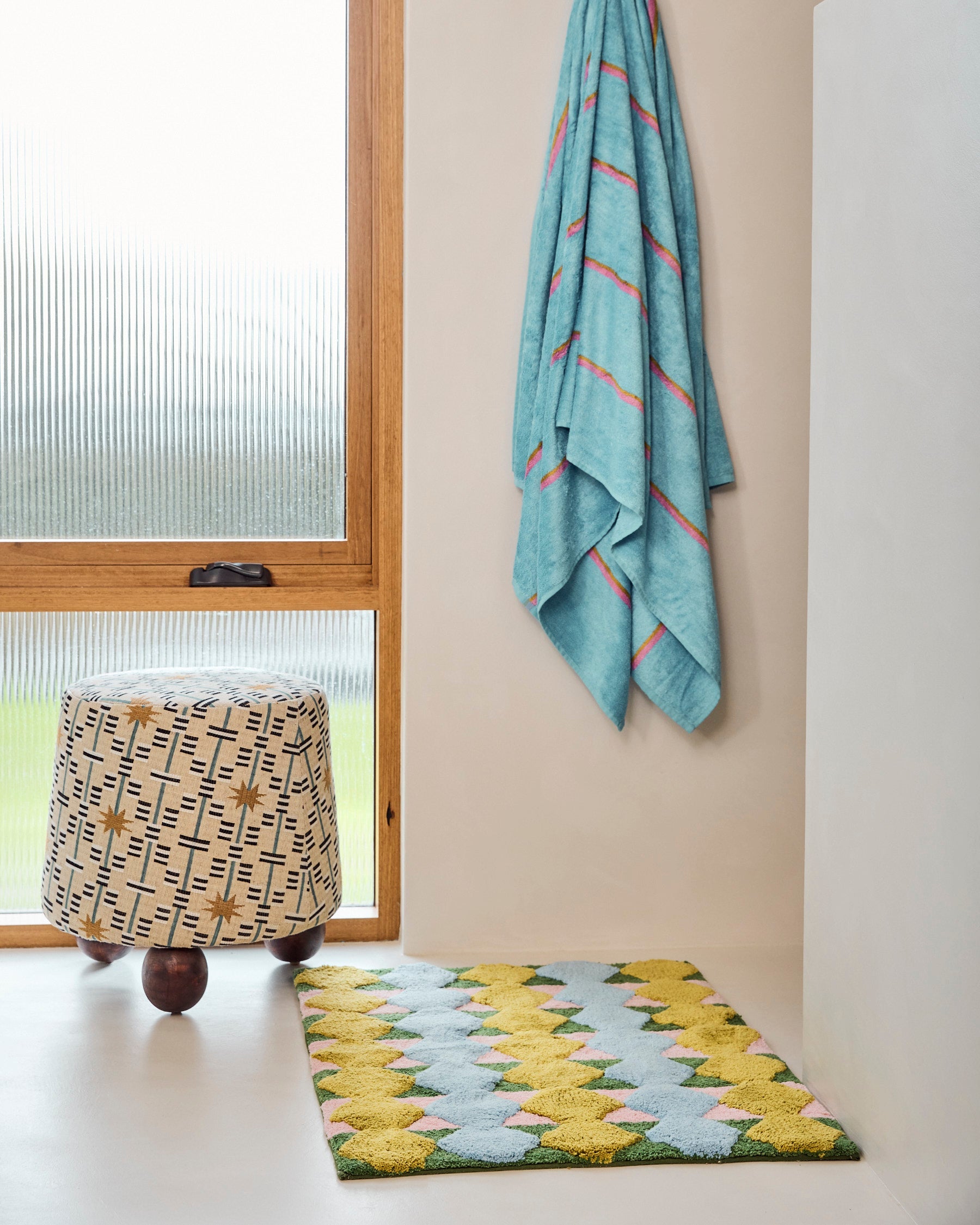 Kip & Co Genie bath mat featuring a colorful, plush design perfect for adding comfort and style to your bathroom.