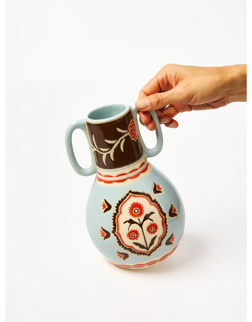 Jones & Co Samira Vase filled with colorful flowers, elegant ceramic flower vase for home decor.