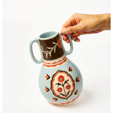 Jones & Co Samira Vase filled with colorful flowers, elegant ceramic flower vase for home decor.