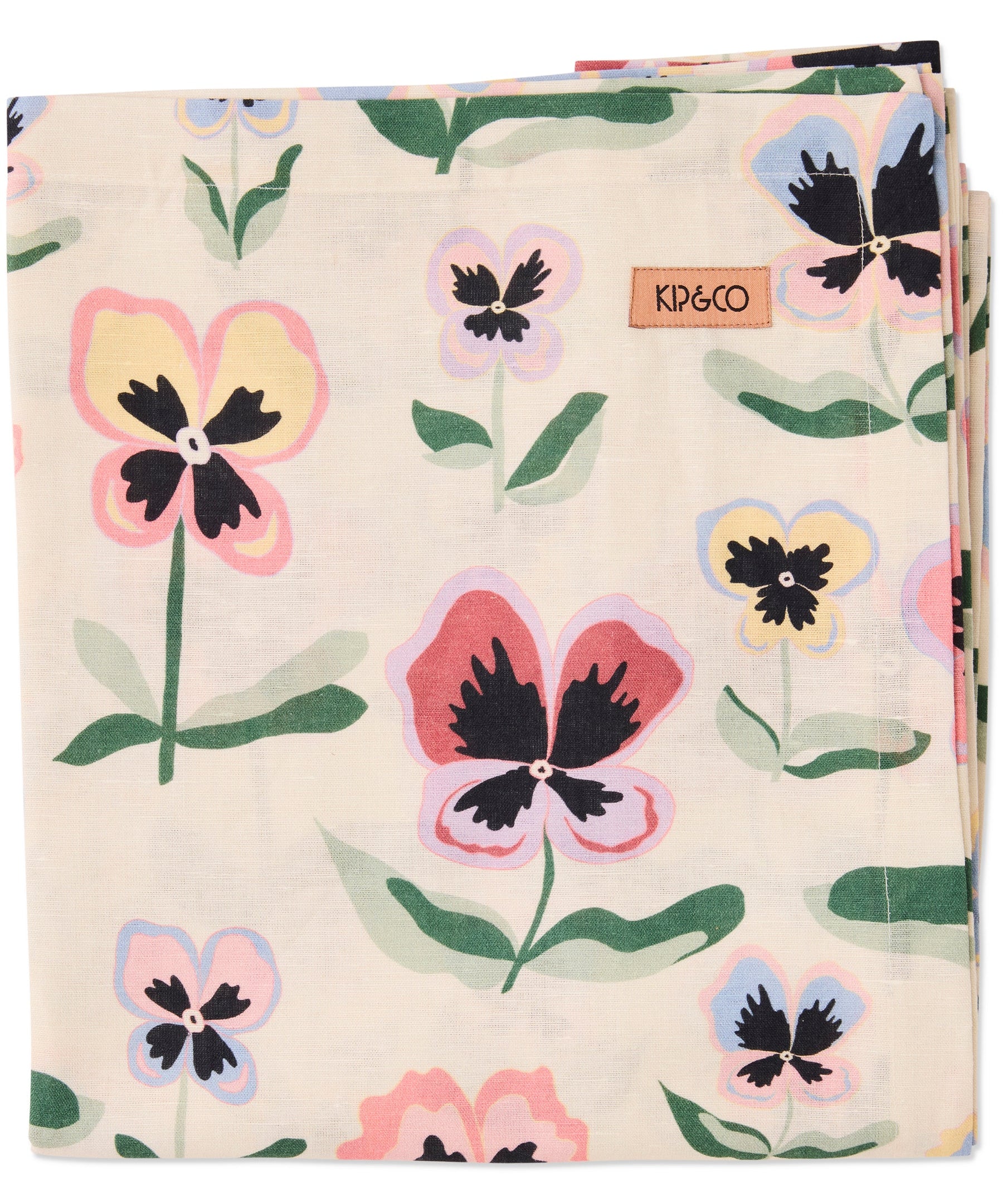 Kip & Co Pretty Pansy Tablecloth with vibrant floral pattern displayed on a dining table.
