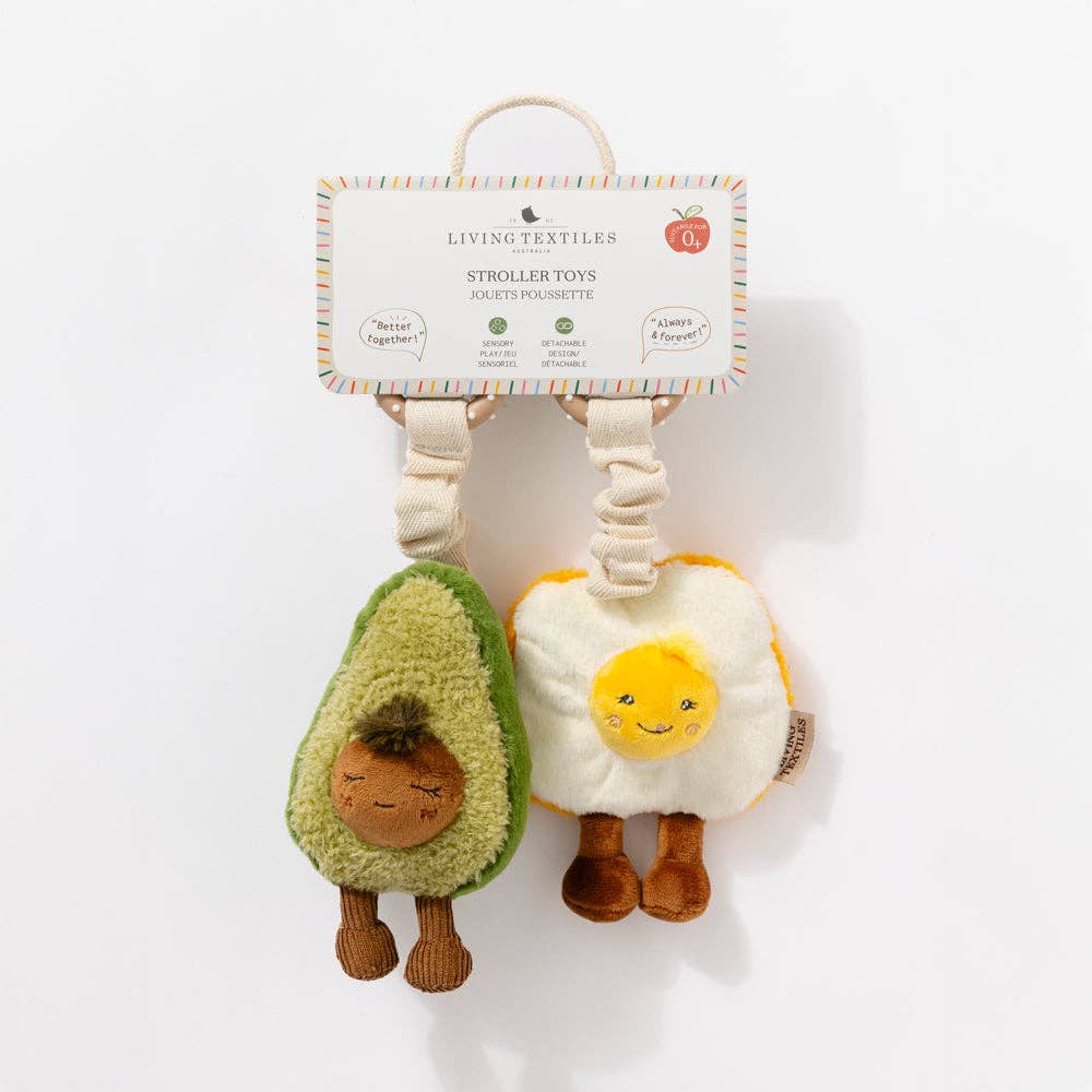 Living Textiles 2-pack mini stroller toys featuring plush avocado and egg on toast designs for babies.