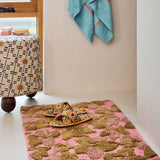 Kip & Co Bloom Bath Mat with colorful floral pattern, non-slip surface, plush texture, designed for bathroom decor and comfort.