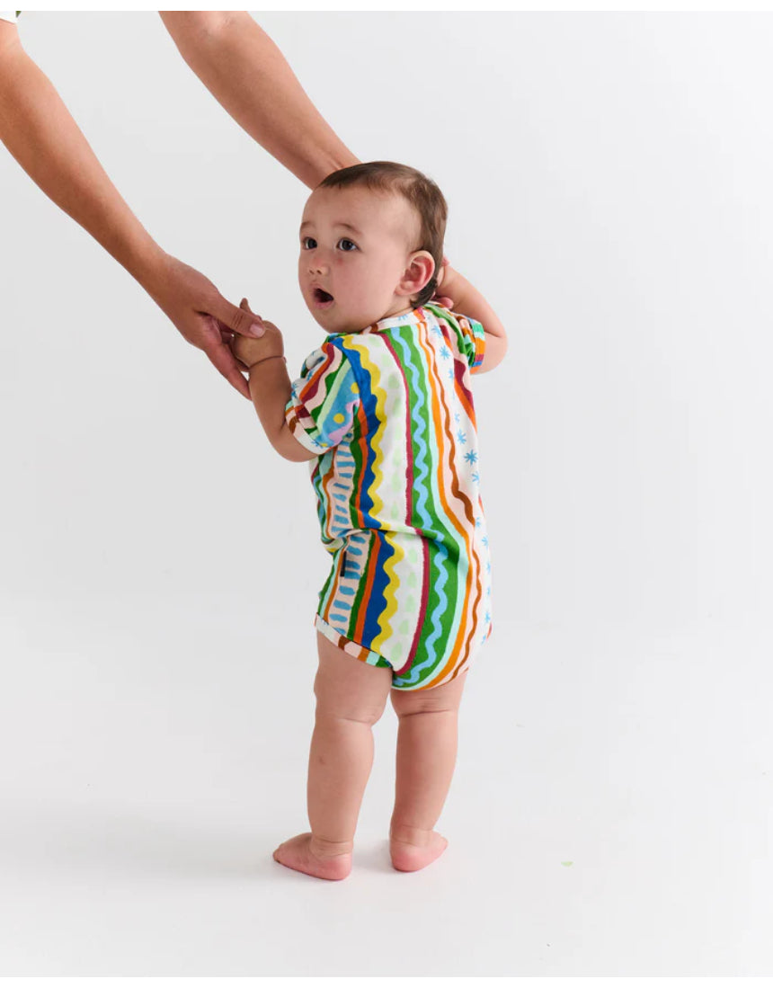 Kip & Co baby clothing beach patterns short sleeve romper with colorful tropical print on soft fabric.