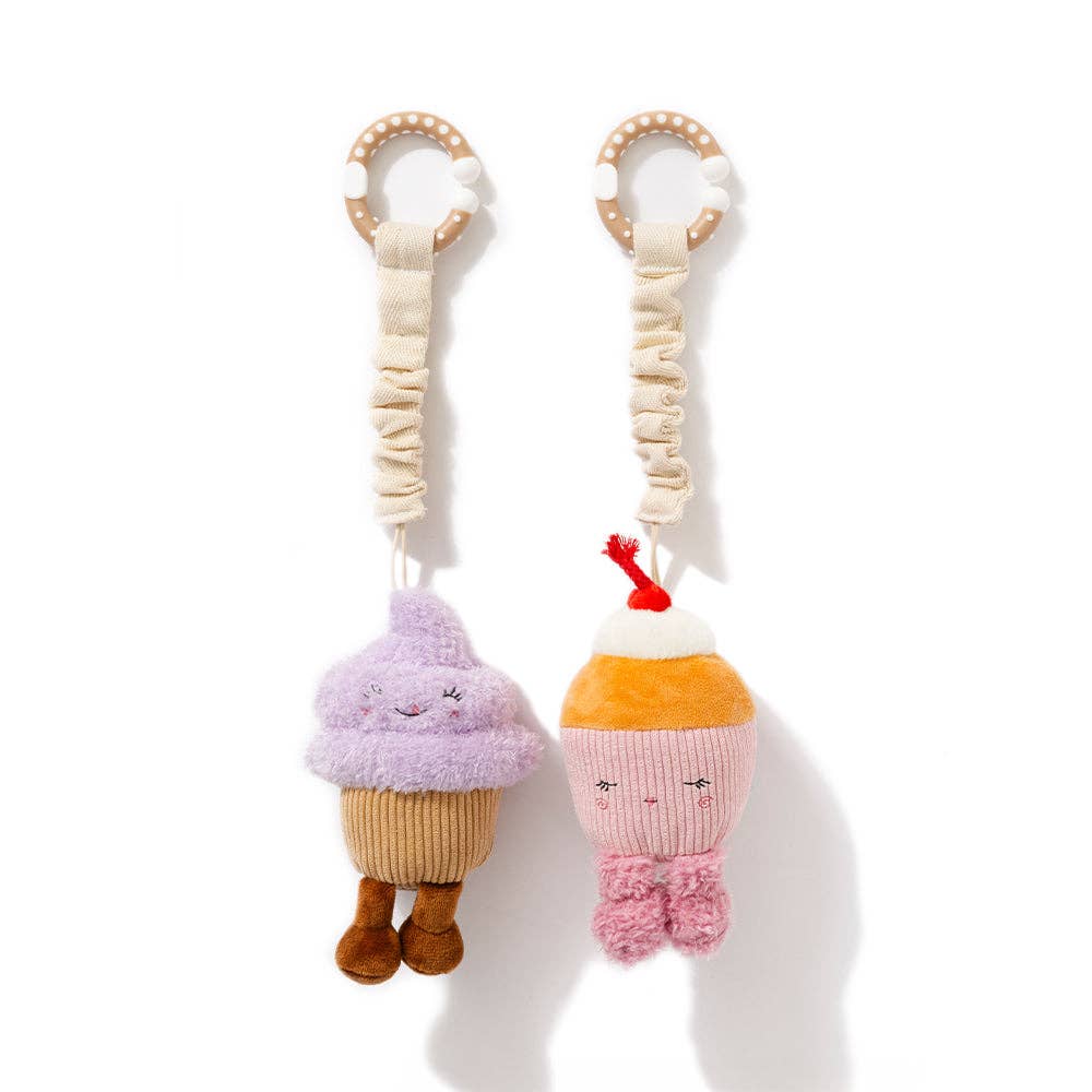Living Textiles stroller toys featuring colorful ice cream and cupcake plush toys for babies and toddlers.