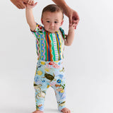 Kip & Co baby beach pattern short sleeve romper with colorful print, soft fabric, and comfortable fit for warm weather.