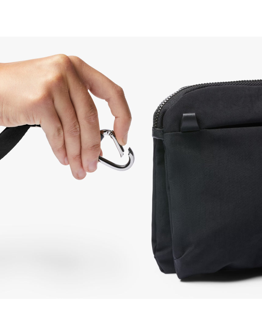 Bellroy Tokyo Side Bag in Raven, a sleek black crossbody bag with adjustable strap and multiple compartments for everyday use.
