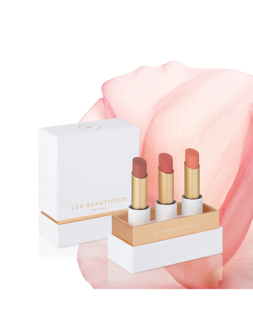Lük Beautifood Lip Nourish Trio with three natural nude lip balms in sleek packaging, perfect for moisturizing and enhancing lips.