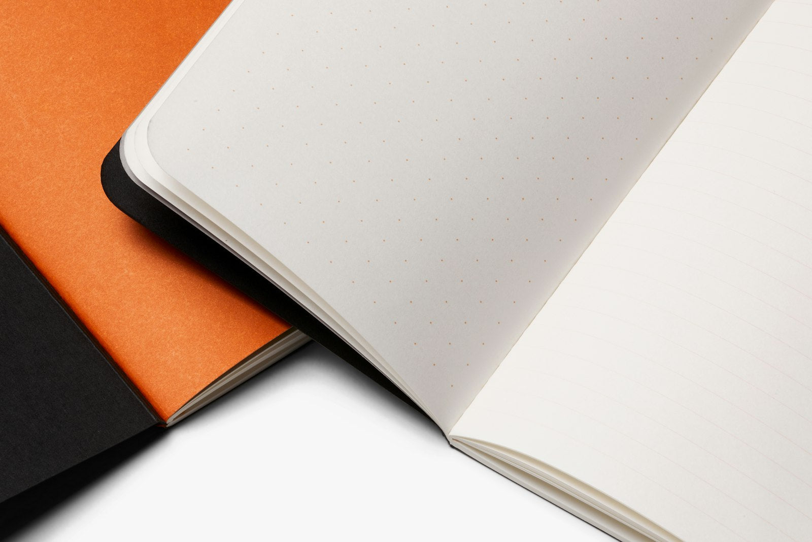 Bellroy black notebook cover with sleek design and leather finish, showing the cover closed with subtle branding visible.